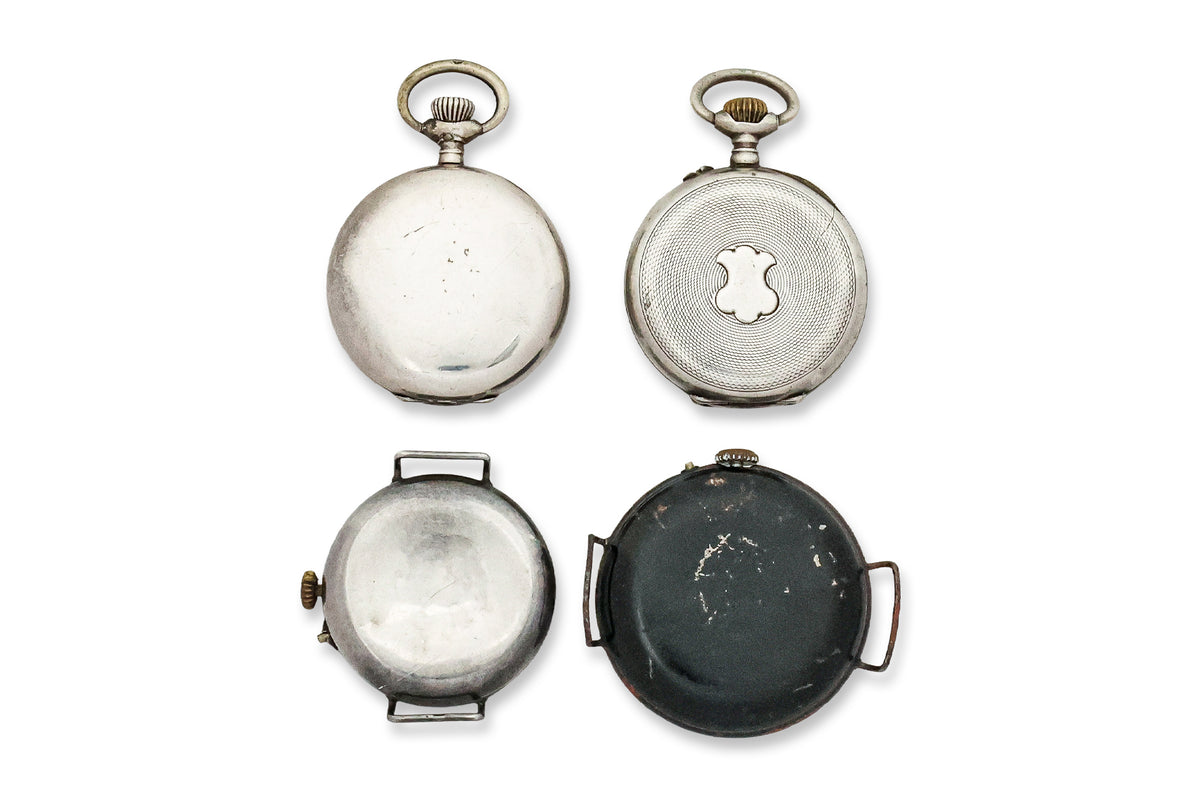 A GROUP OF FOUR WATCHES