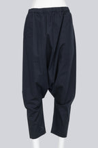 COMME DES GARCONS - A PAIR OF 2014 COTTON BLEND NAVY DROP CROTCH TROUSERS