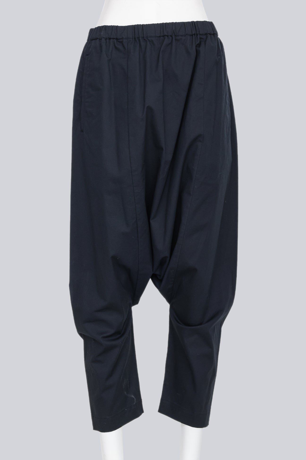 COMME DES GARCONS - A PAIR OF 2014 COTTON BLEND NAVY DROP CROTCH TROUSERS