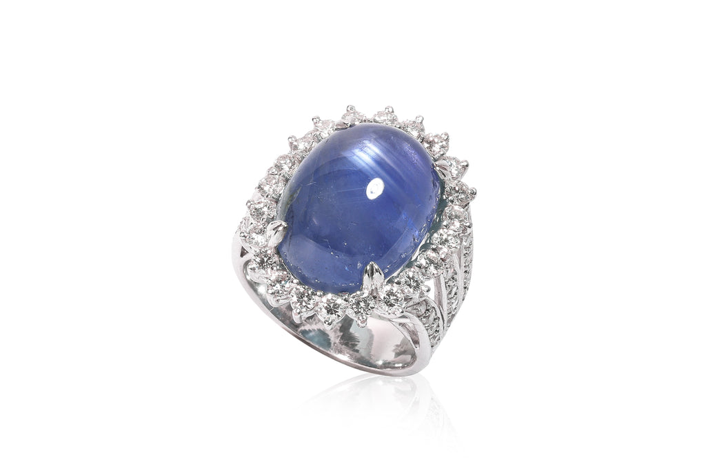A STAR SAPPHIRE AND DIAMOND RING