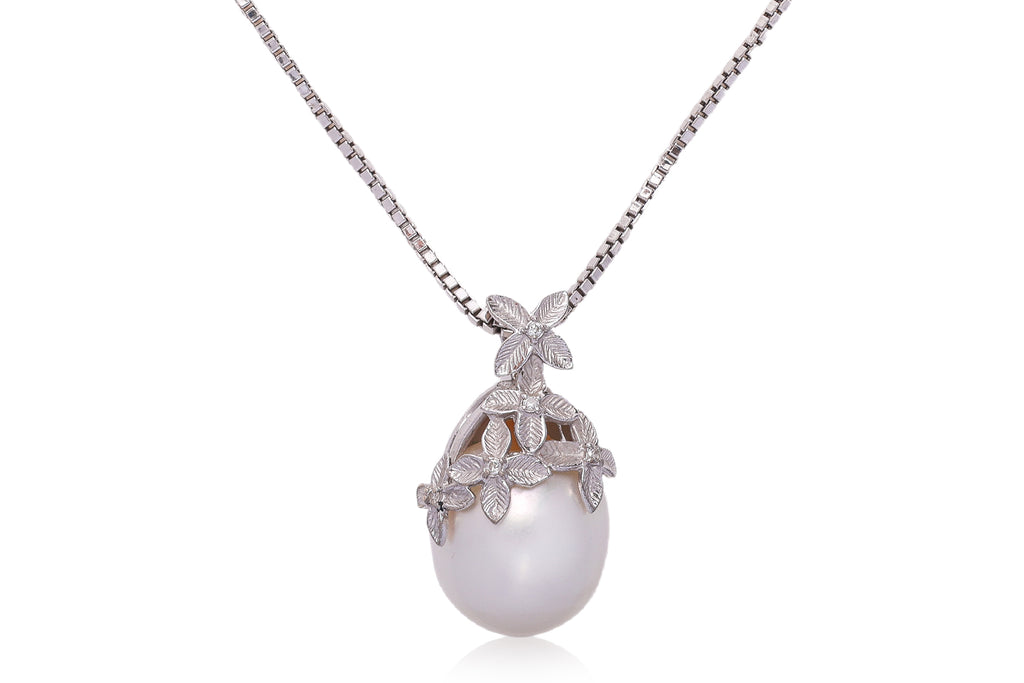 A SOUTH SEA CULTURED PEARL AND DIAMOND PENDANT ON CHAIN
