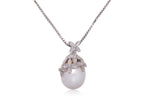 A SOUTH SEA CULTURED PEARL AND DIAMOND PENDANT ON CHAIN