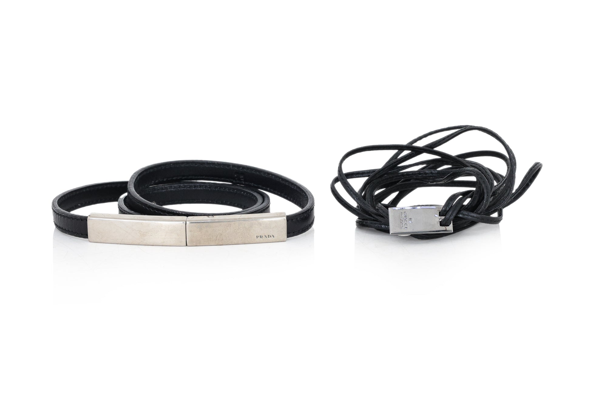 PRADA & GUCCI - TWO LEATHER BELTS AND A BUCKLE