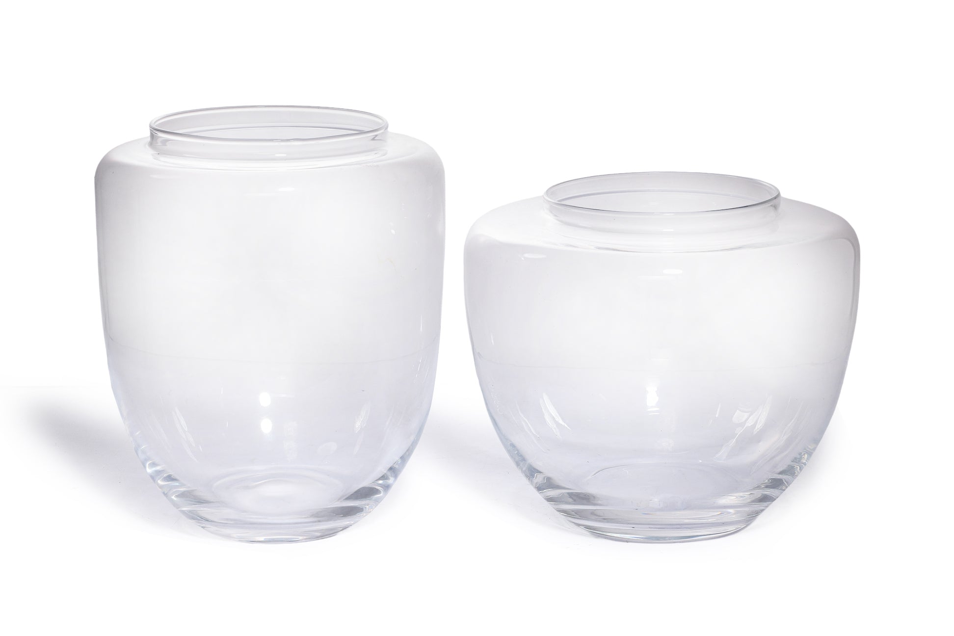 A GROUP OF THREE IVV GLASS JARS WITH COLOURED LIDS