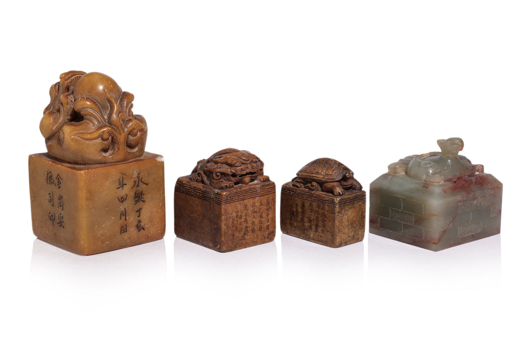 A GROUP OF SEVEN CARVED STONE SEALS