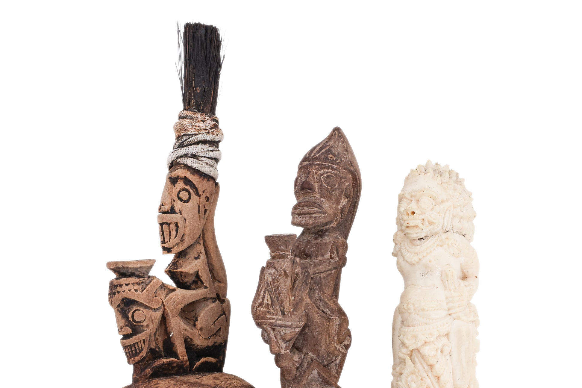 A GROUP OF SOUTHEAST ASIAN CARVED OBJECTS