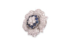 A DIAMOND AND SAPPHIRE 'FLOWER' PENDANT/BROOCH