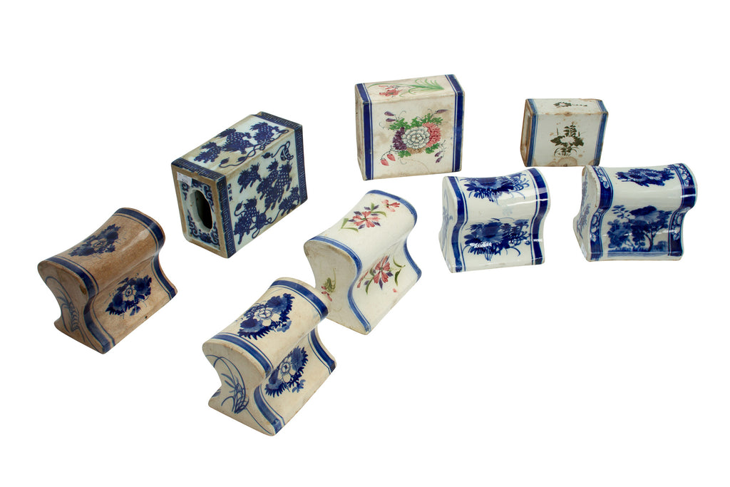 A GROUP OF EIGHT PORCELAIN PILLOWS