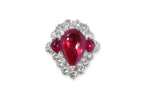 A LEAD GLASS FILLED RUBY AND DIAMOND RING