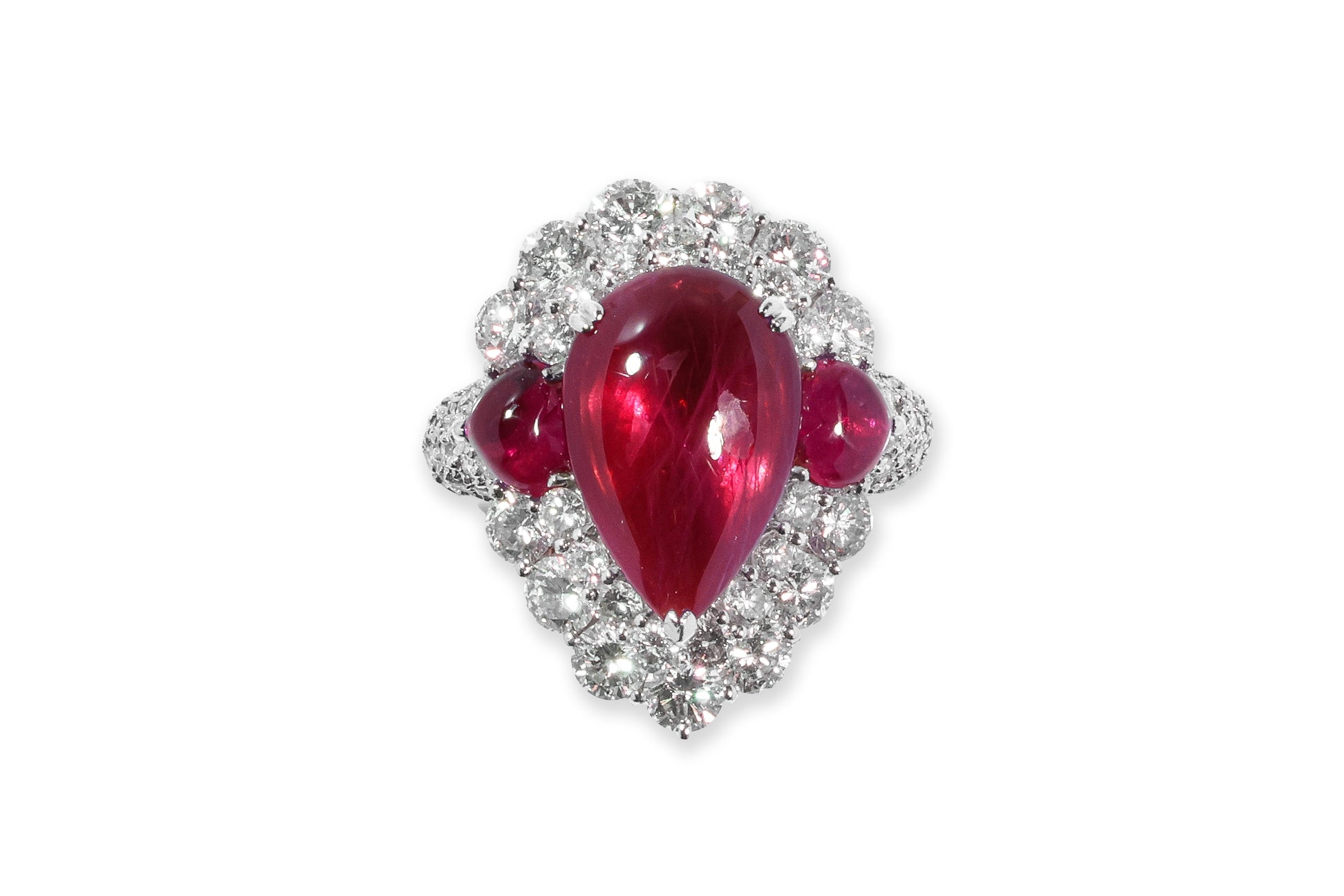 A LEAD GLASS FILLED RUBY AND DIAMOND RING
