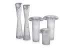 A GROUP OF EUROPEAN GLASS CANDLESTICKS AND VASES