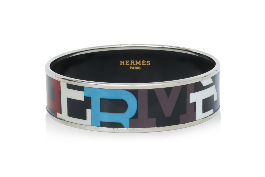HERMÈS - A 'CAPITALES' ENAMEL BANGLE