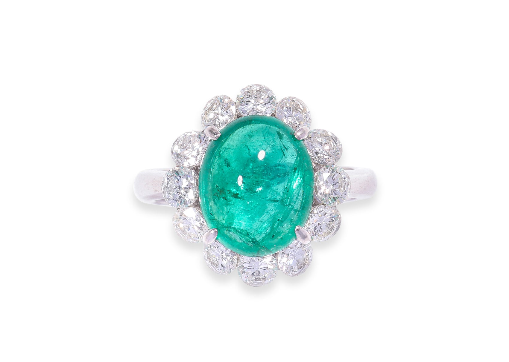 A ZAMBIAN EMERALD AND DIAMOND 'HALO' RING