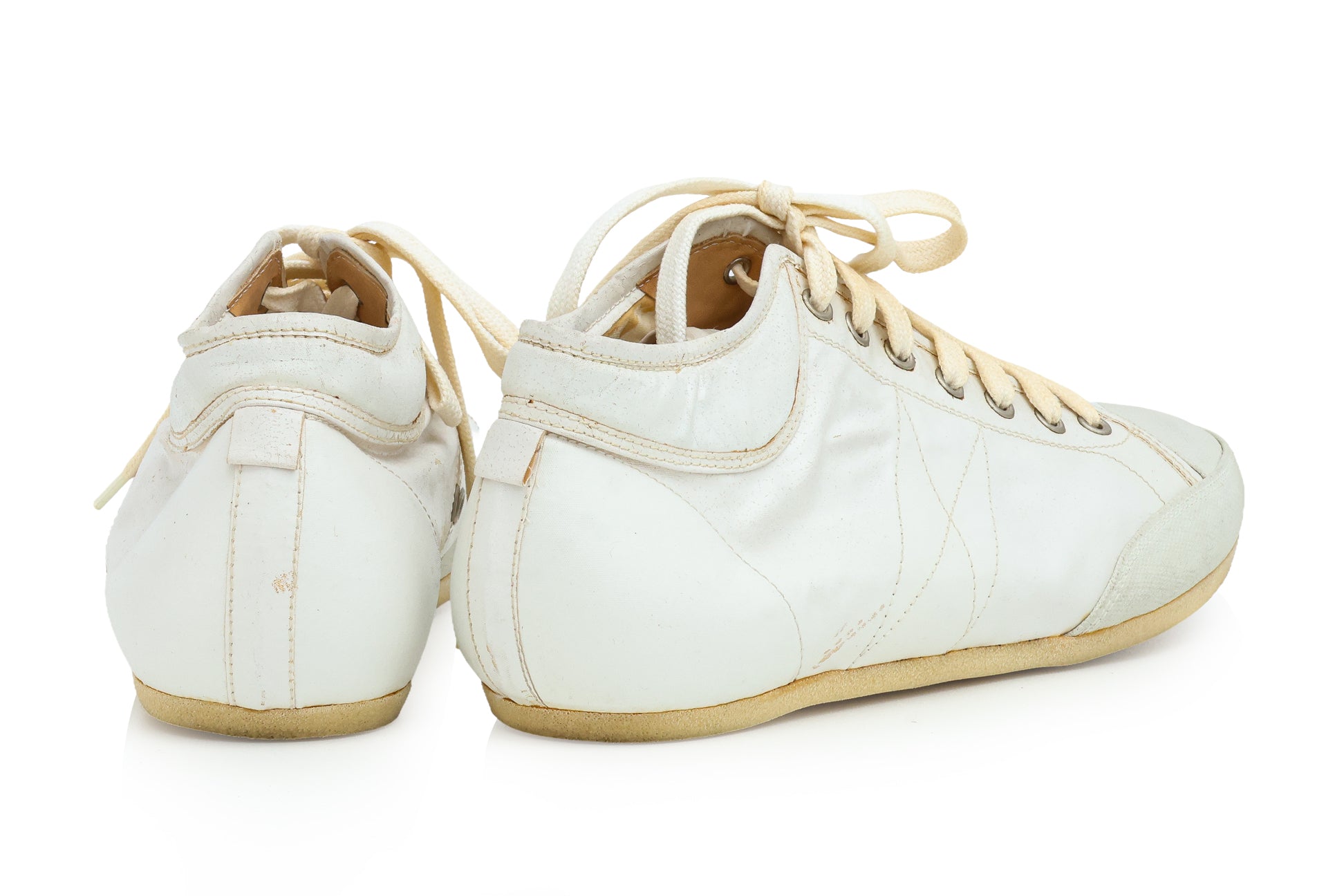 DRIES VAN NOTEN - A PAIR OF WHITE LEATHER TRAINERS