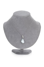 A LARGE BAROQUE SOUTH SEA PEARL AND DIAMOND PENDANT ON CHAIN