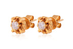 A PAIR OF HIGH KARAT GOLD DIAMOND STUD EARRINGS
