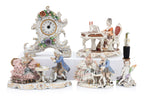 A GROUP OF FIVE GERMAN PORCELAIN FIGURES AND A CLOCK