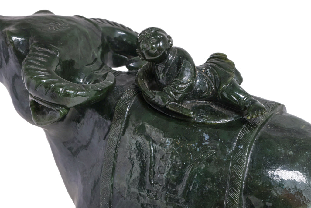 A LARGE SPINACH JADE BUFFALO AND BOY VESSEL