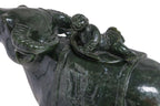 A LARGE SPINACH JADE BUFFALO AND BOY VESSEL