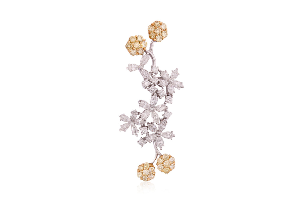 A DIAMOND AND YELLOW DIAMOND 'FLOWER BRANCH' PENDANT