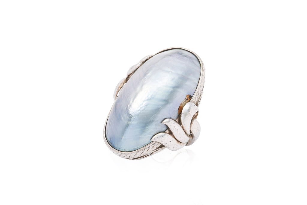 AN ABALONE SHELL RING