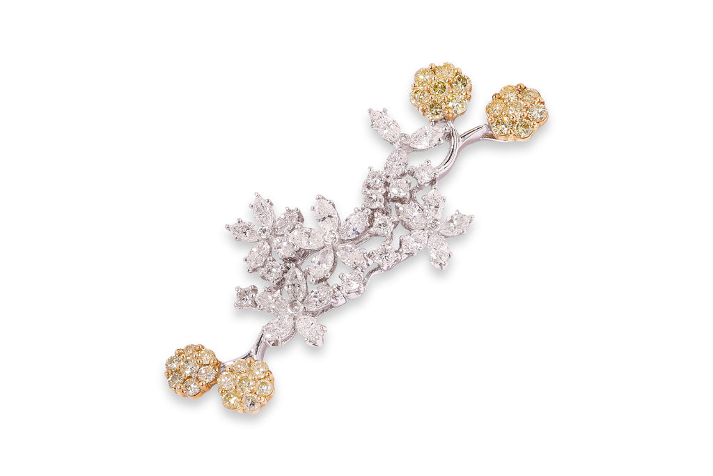 A DIAMOND AND YELLOW DIAMOND 'FLOWER BRANCH' PENDANT