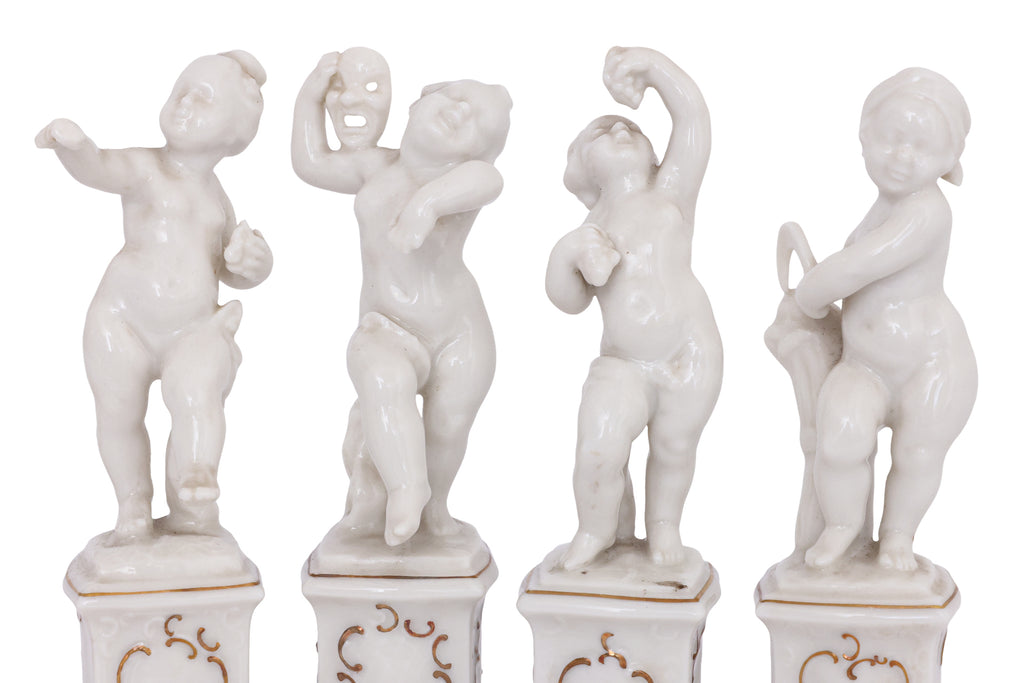 A GROUP OF SIX HUTSCHENREUTHER PORCELAIN FIGURES OF CHERUBS