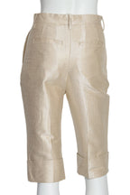 TSUMORI CHISATO - A PAIR OF GOLD-TONE CAPRIS