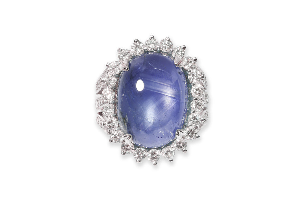 A STAR SAPPHIRE AND DIAMOND RING