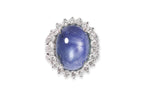 A STAR SAPPHIRE AND DIAMOND RING