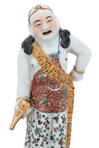 A FAMILLE ROSE PORCELAIN FIGURE OF LIU HAI