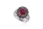 A TOURMALINE, BLACK DIAMOND AND DIAMOND RING