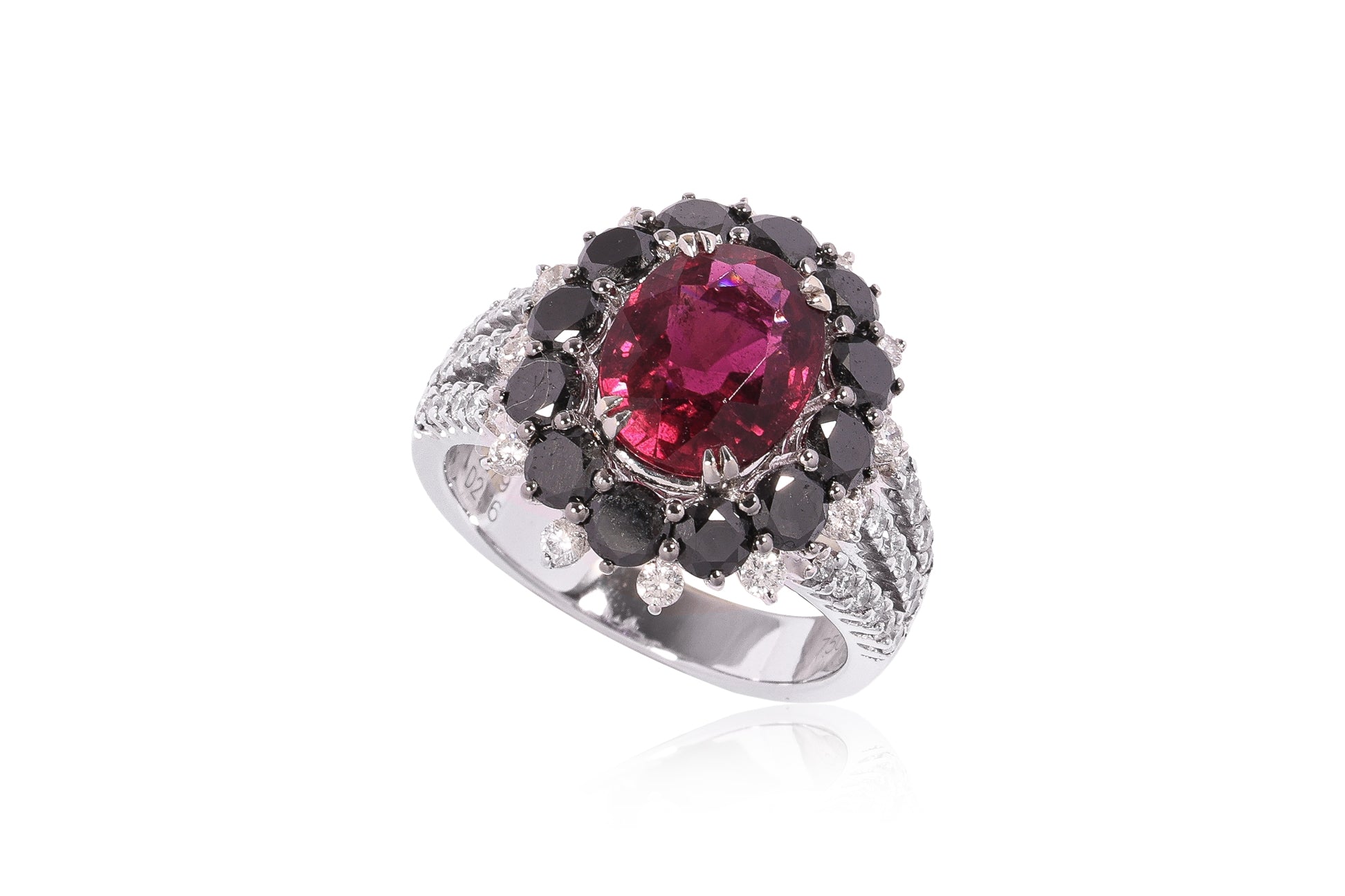 A TOURMALINE, BLACK DIAMOND AND DIAMOND RING