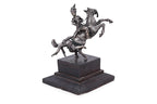 A BURMESE WHITE METAL MODEL OF FIGURES ON HORSEBACK