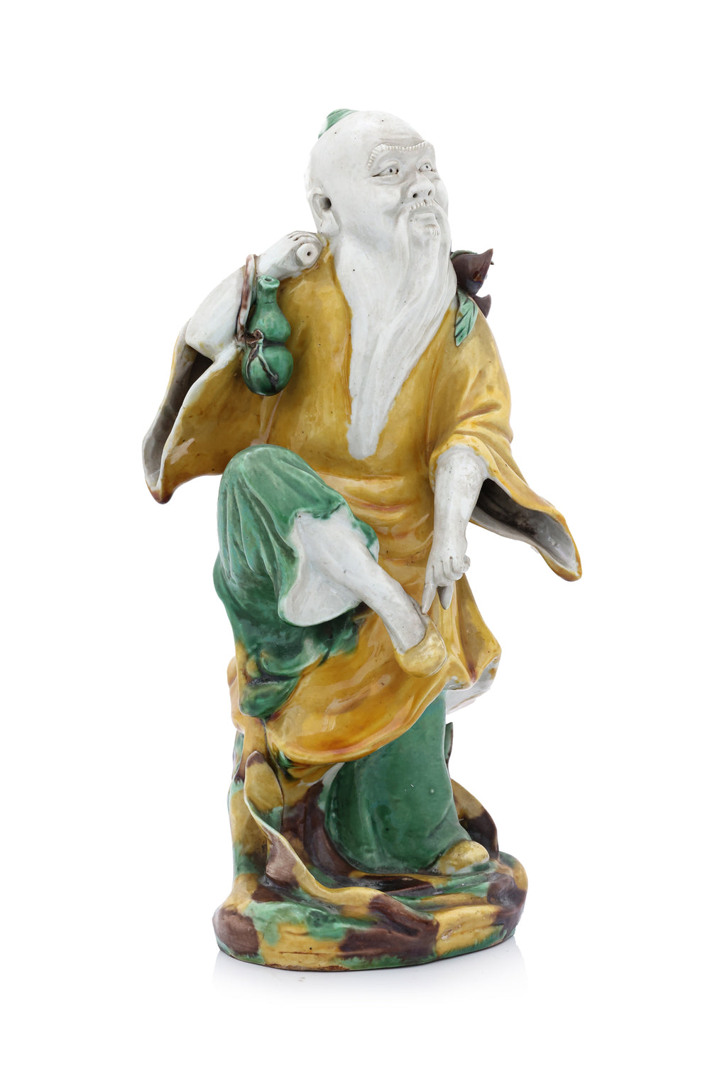 A SANCAI-GLAZED PORCELAIN FIGURE OF DONGFANG SHUO