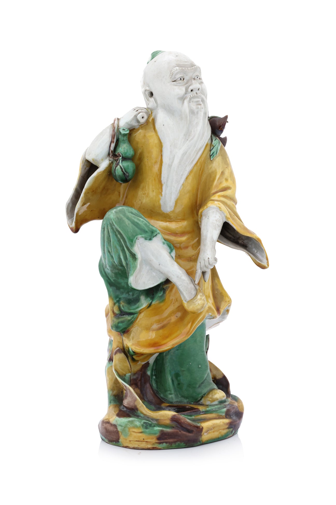 A SANCAI-GLAZED PORCELAIN FIGURE OF DONGFANG SHUO