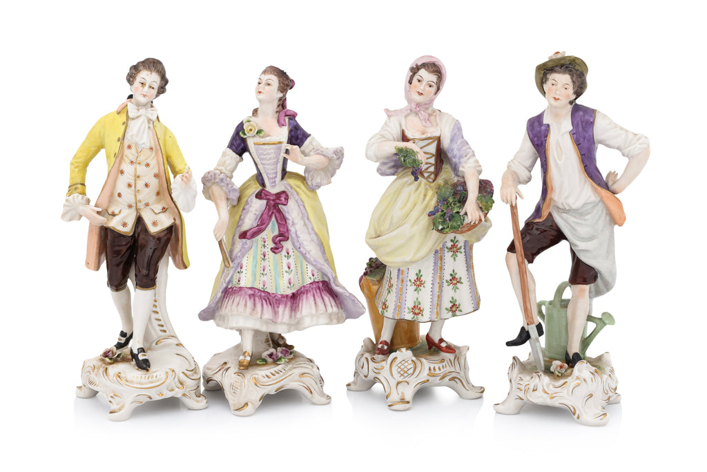 A GROUP OF FOUR RUDOLF KAMMER VOLKSTEDT PORCELAIN FIGURES