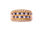 A DIAMOND AND SAPPHIRE BAND RING
