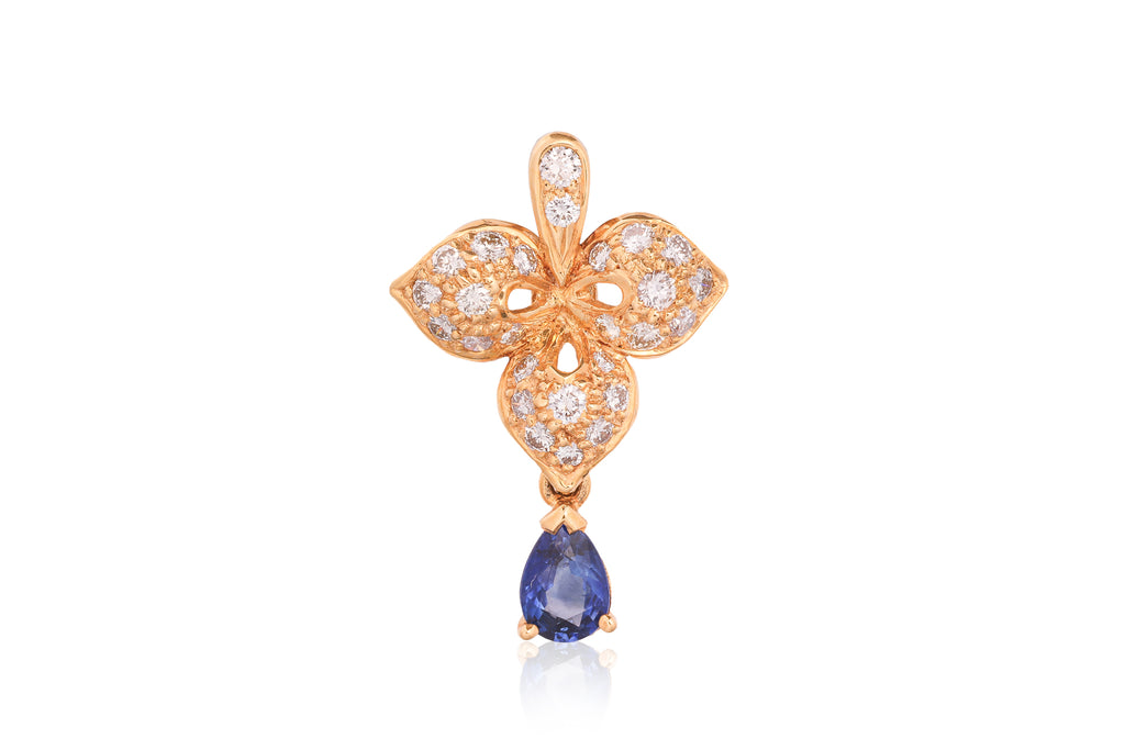 A HIGH KARAT GOLD SAPPHIRE AND DIAMOND 'LEAF' PENDANT