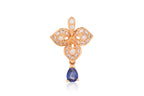 A HIGH KARAT GOLD SAPPHIRE AND DIAMOND 'LEAF' PENDANT
