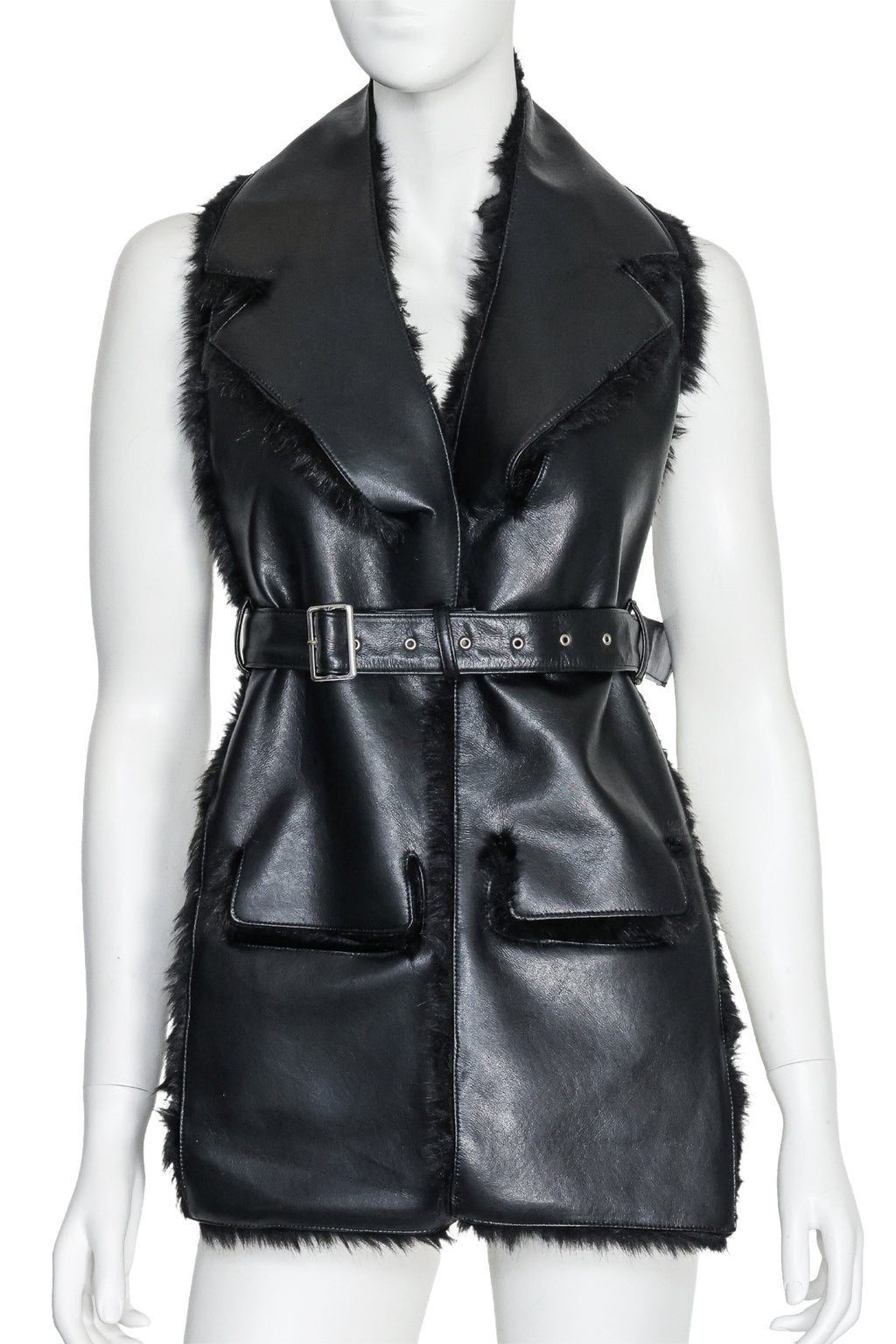 NOIR KEI NINOMIYA - A SYNTHETIC LEATHER AND FAUX FUR VEST, FALL RTW 2019