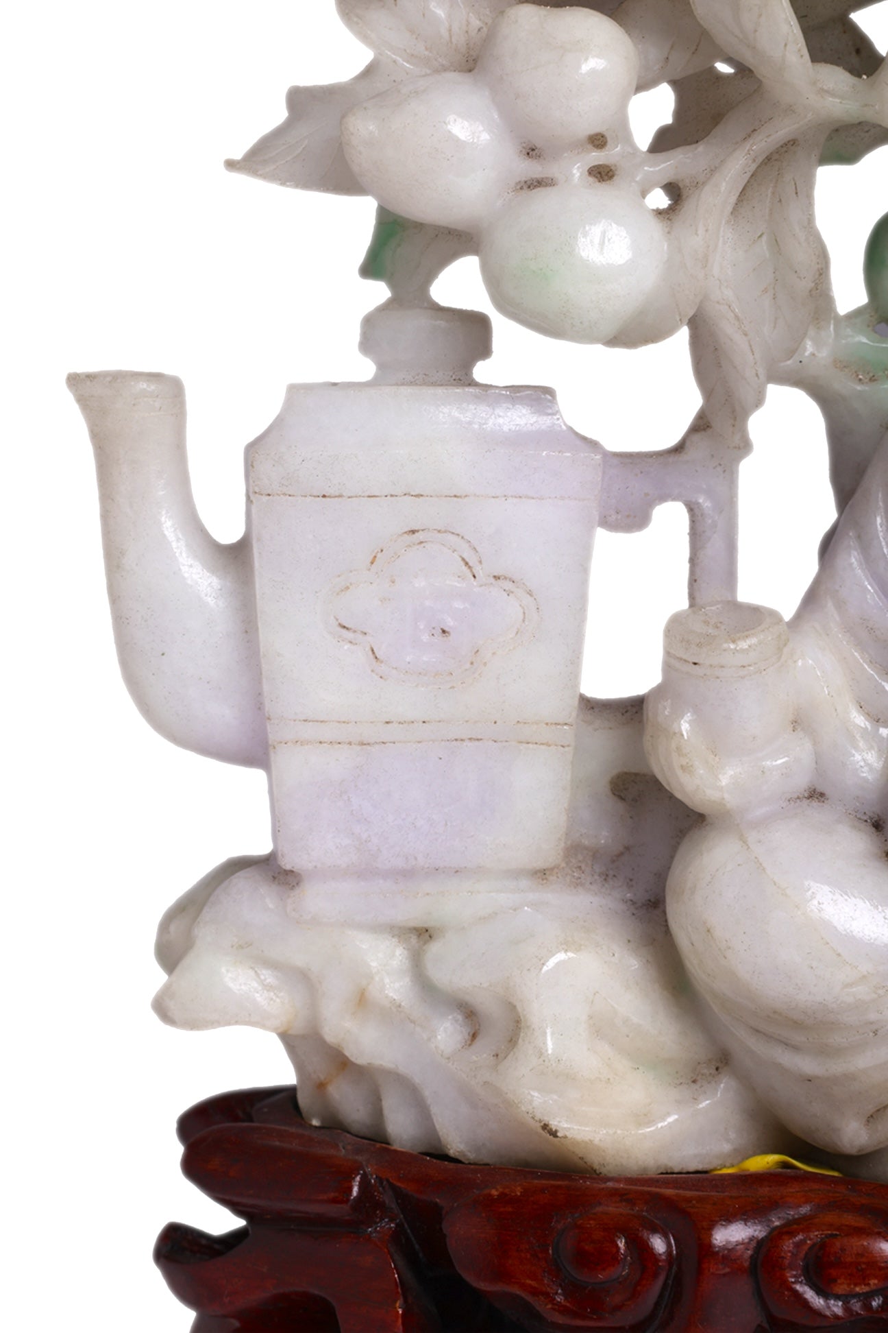 A LARGE JADEITE CARVING OF BUDAI BENEATH A PEACH TREE