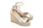 STUART WEITZMAN - A PAIR OF NIDISTVURVE ESPADRILLE WEDGES IN PLATINUM COLOUR