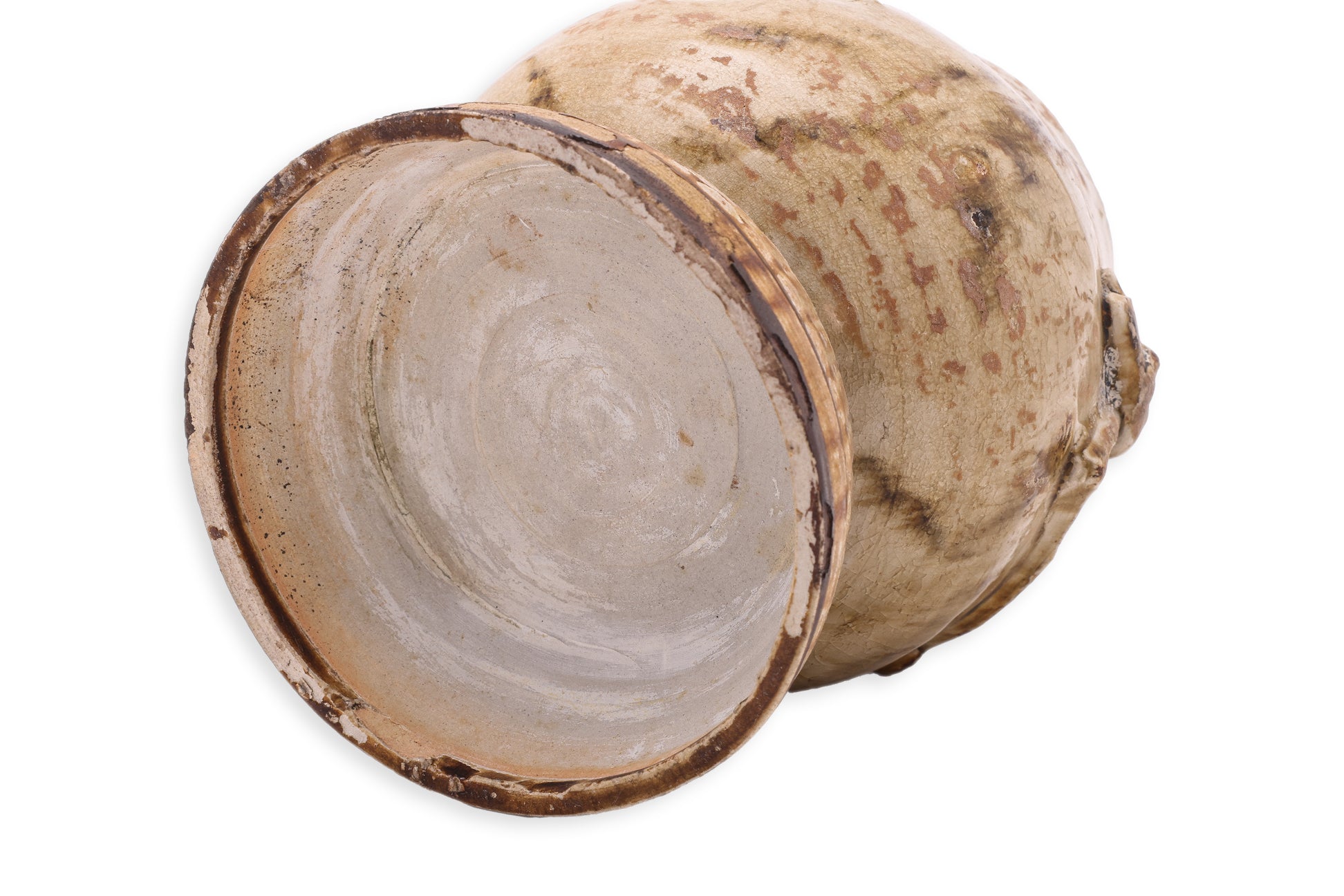 AN EARTHENWARE GRANARY JAR AND COVER