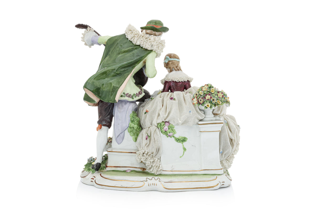 AN UNTERWEISSBACH FIGURAL PORCELAIN GROUP OF A COURTING COUPLE