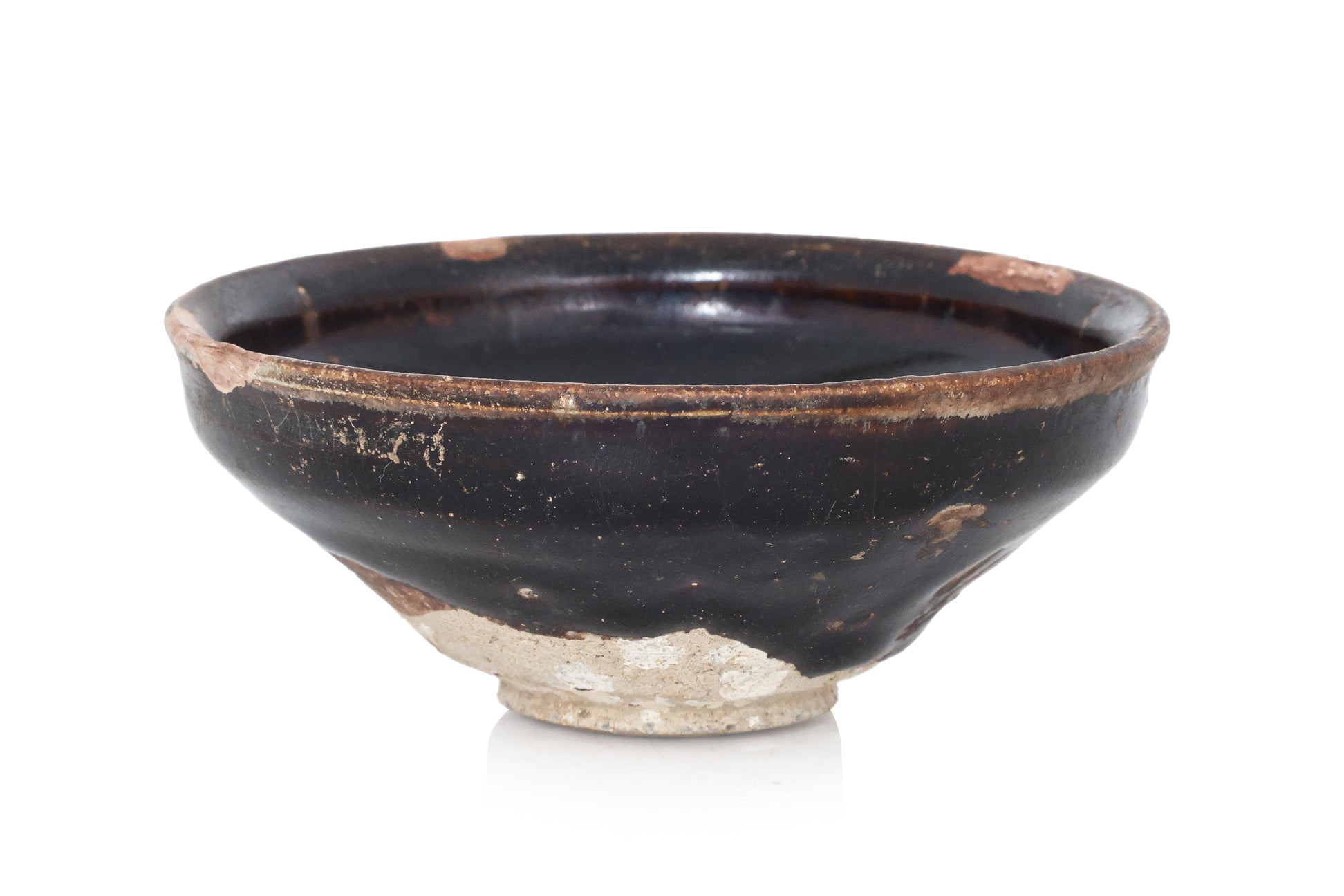 A BLACK-GLAZED STONEWARE BOWL