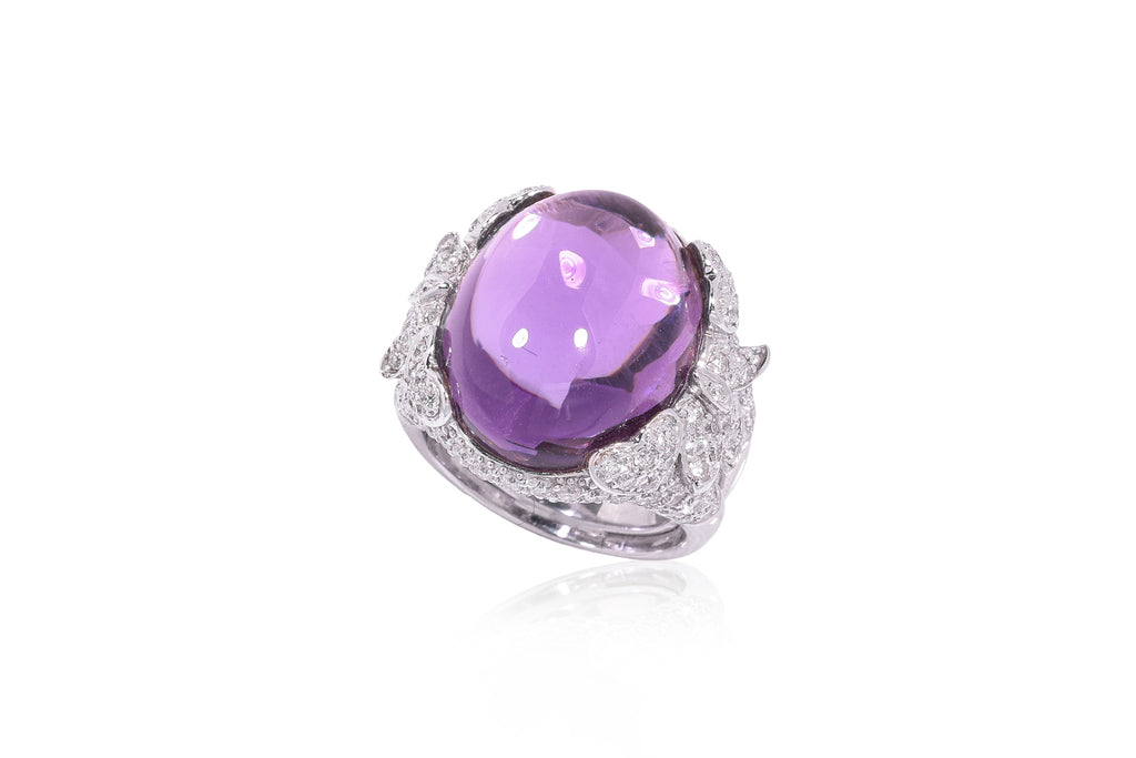 AN AMETHYST AND DIAMOND COCKTAIL RING