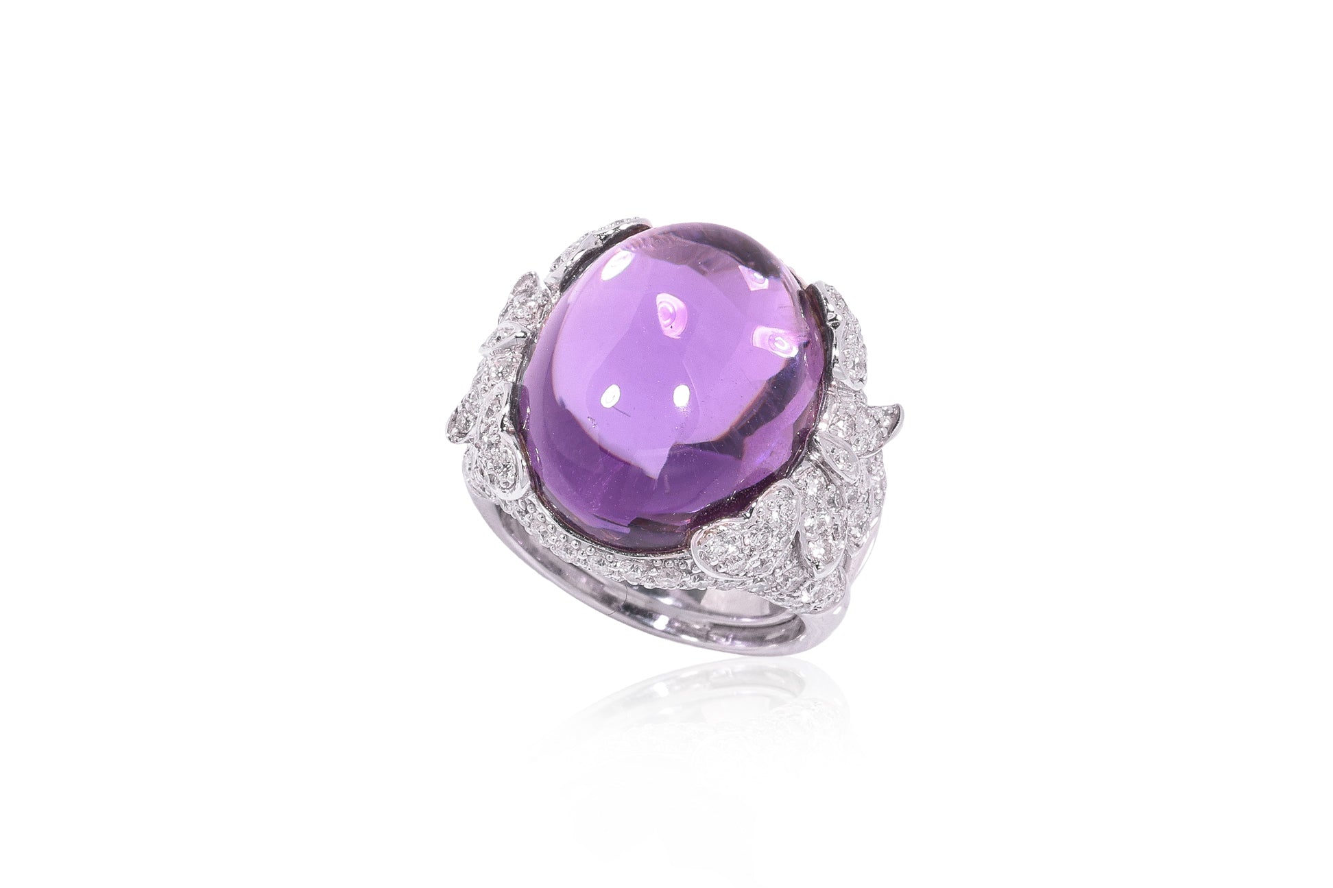 AN AMETHYST AND DIAMOND COCKTAIL RING