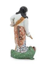 A FAMILLE ROSE PORCELAIN FIGURE OF LIU HAI