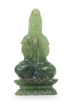 A SERPENTINE JADE FIGURE OF GUAN YIN